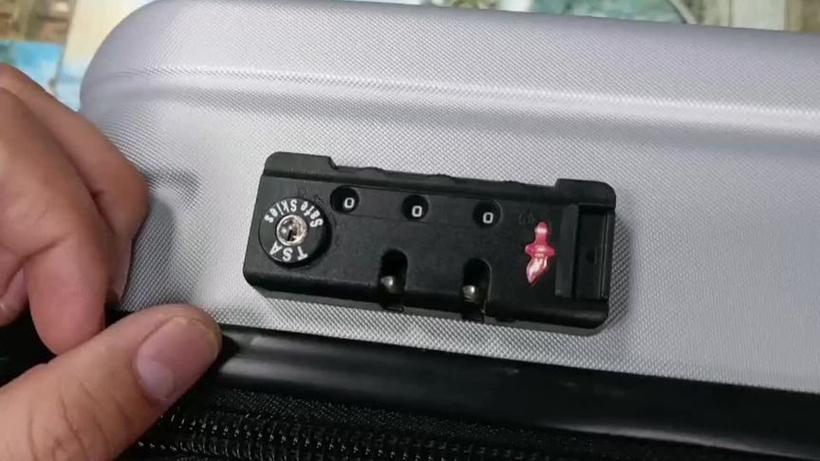 拉链款行李箱如何改密码缩略图