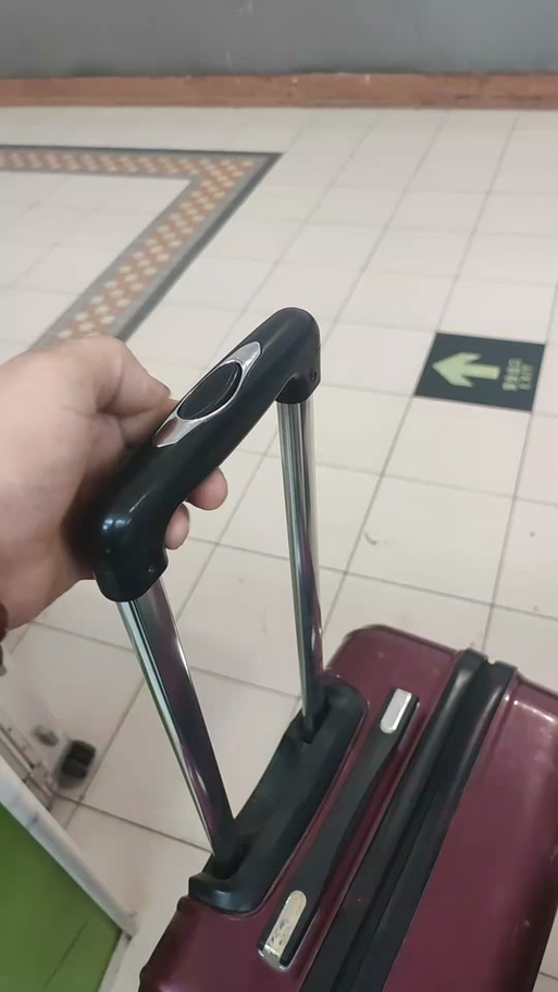 行李箱拉杆缩不回去缩略图